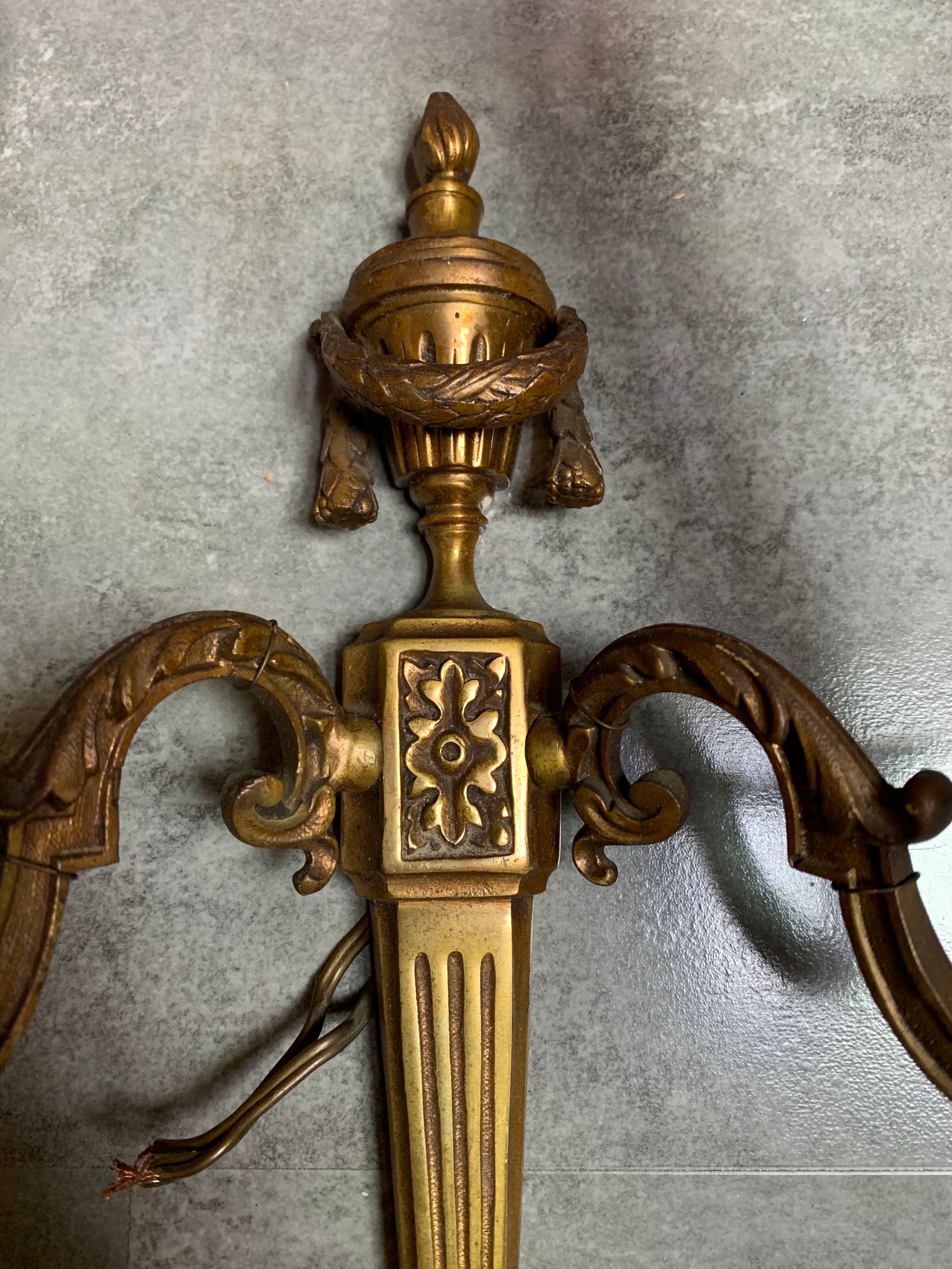Double brass sconces