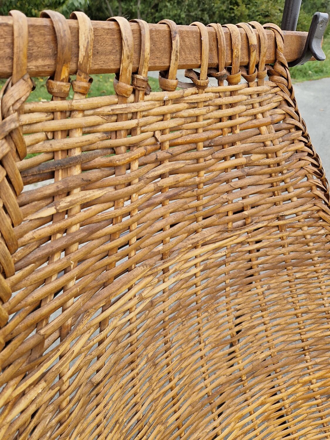 Large vintage metal and wicker armchair