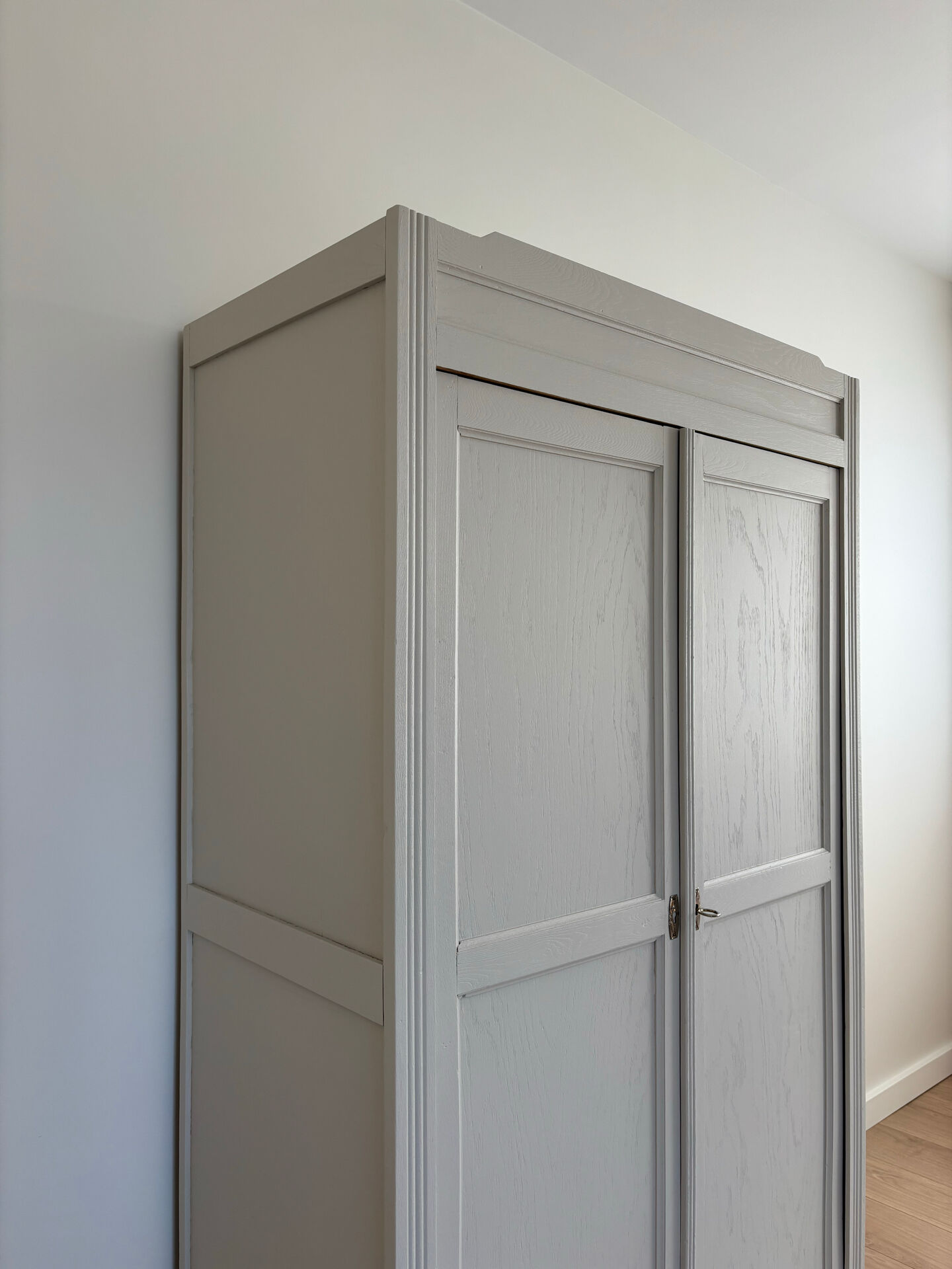 Large Parisian wardrobe in renovated oak wood.