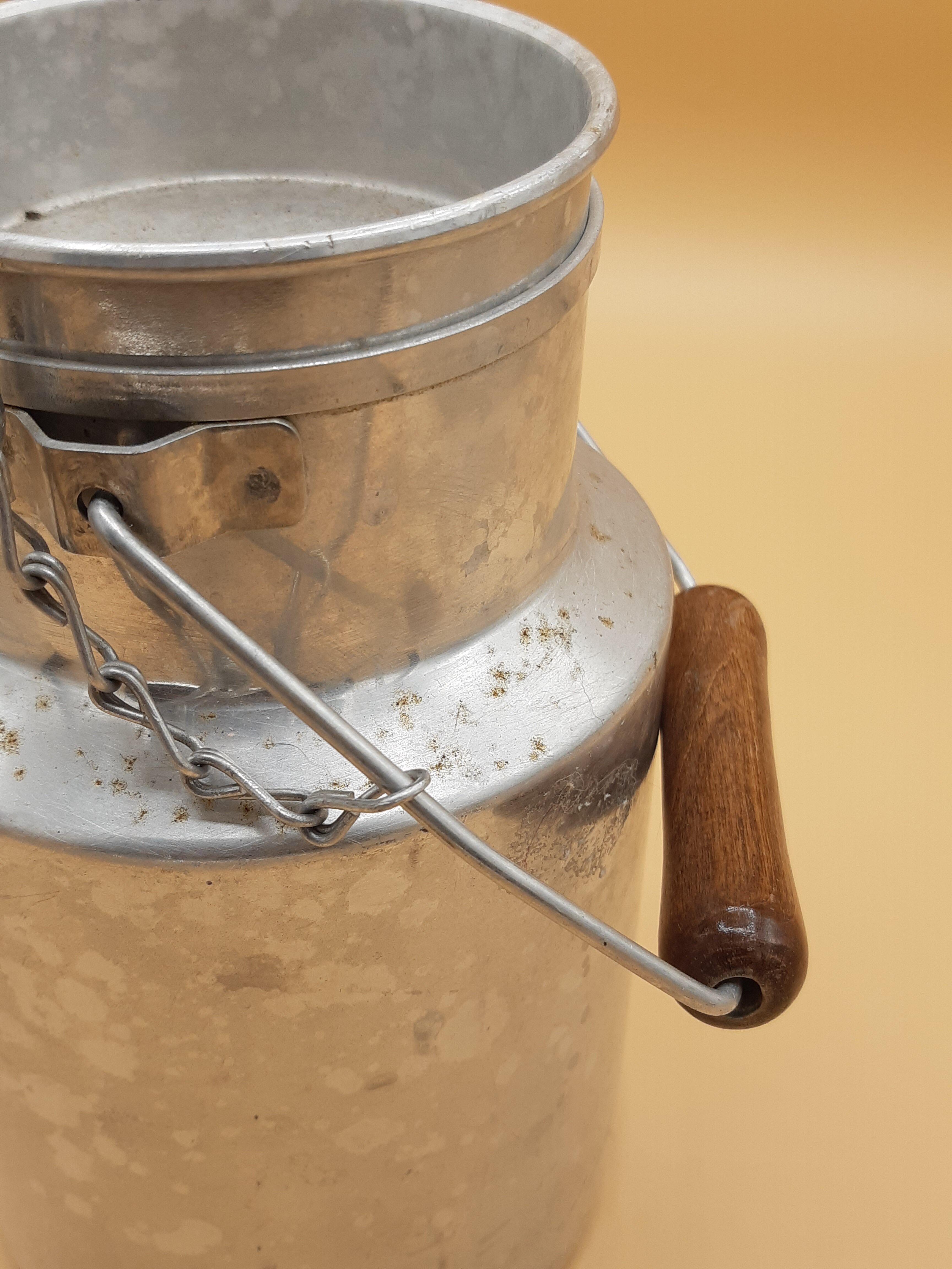 Old aluminum milk jars, wooden handle, lot of 2