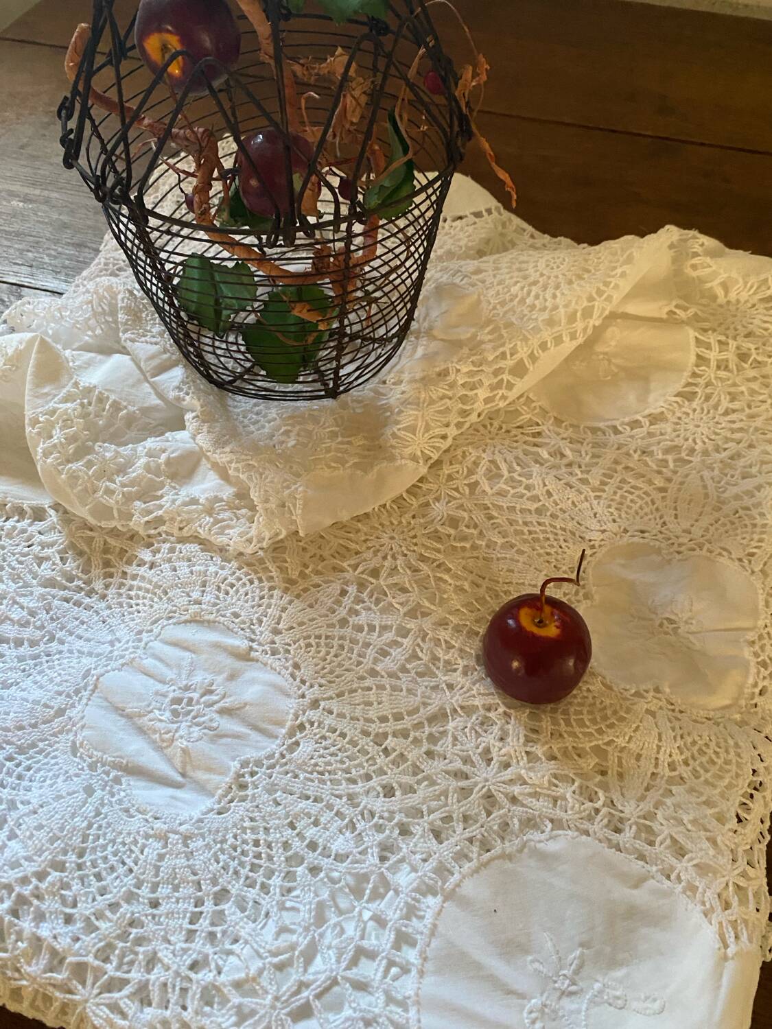 White cotton tablecloth with crochet lace.