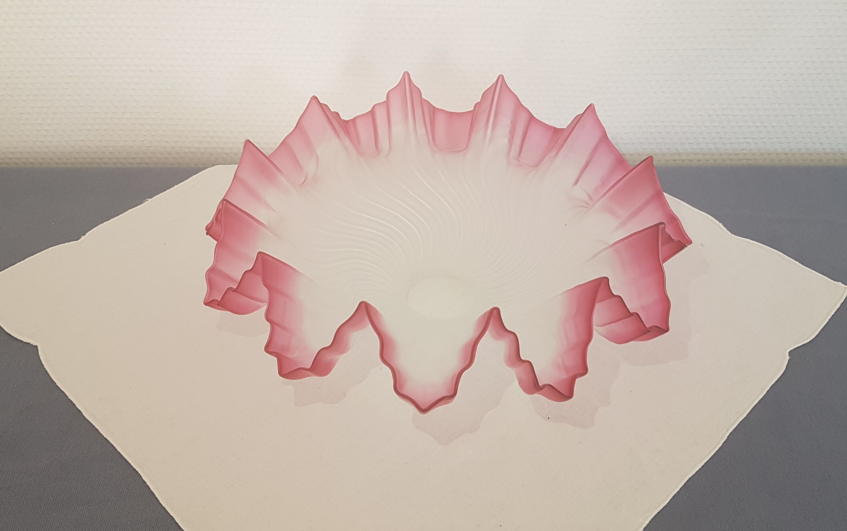 Old glass and pink lace lampshade