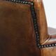 Amazing cognac-coloured sheepskin dining/side chair with armrests