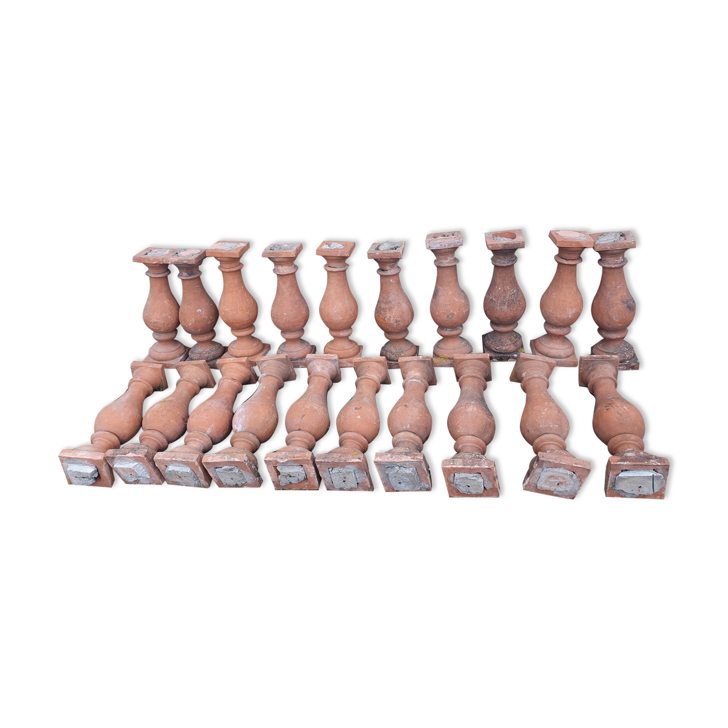 About twenty terracotta balusters from Castelnaudary