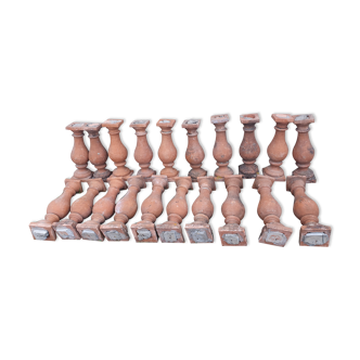 About twenty terracotta balusters from Castelnaudary