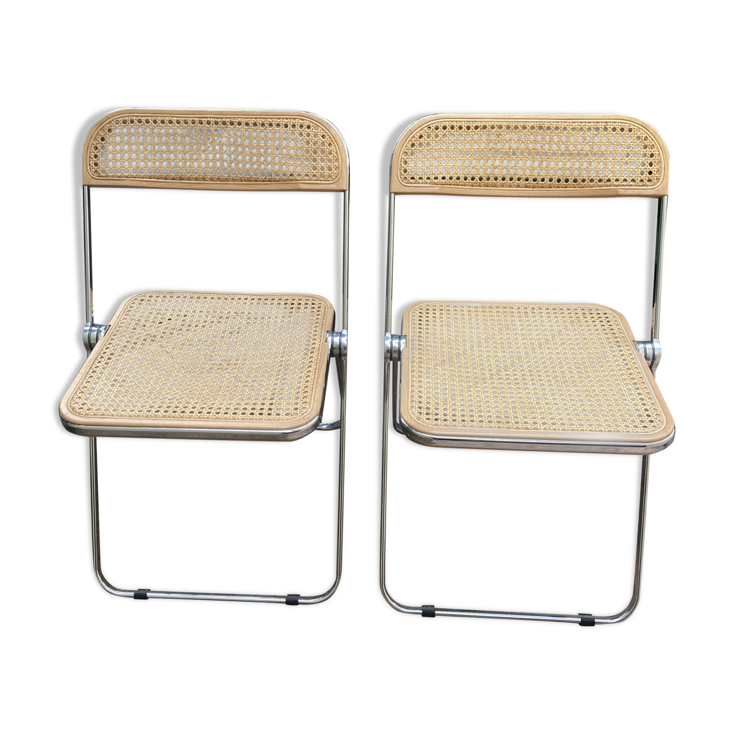 Plia chairs by Castelli in wood and cane.