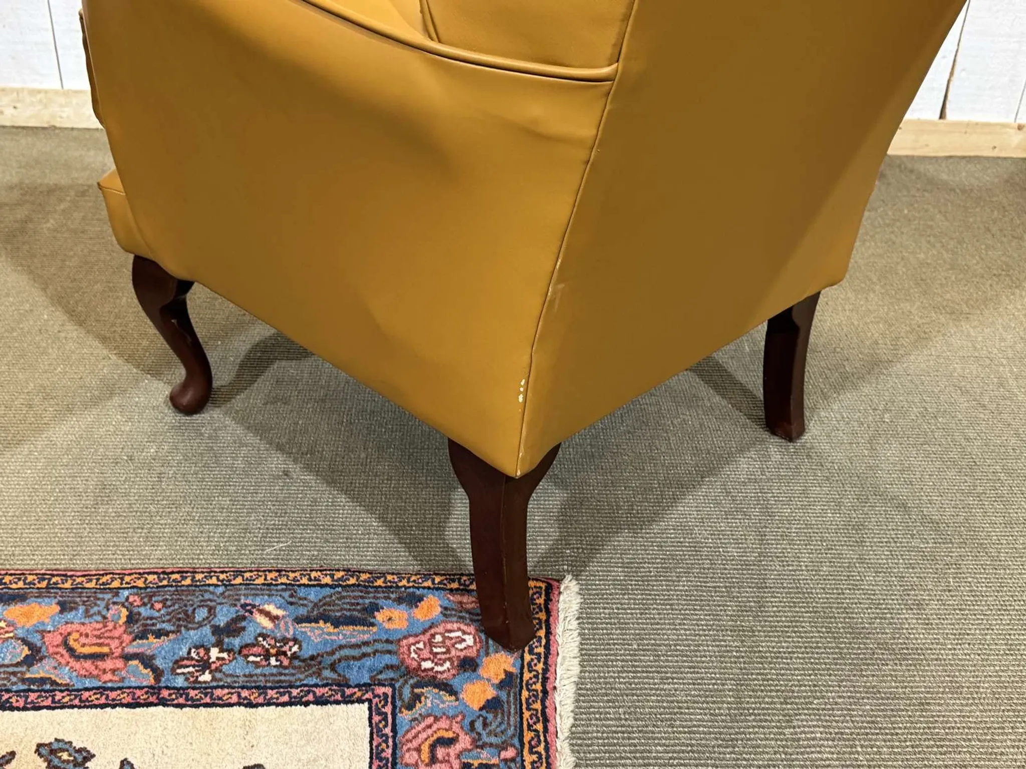 Pair of 1980s English wingback armchairs in leather.