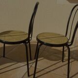 4 Chaises bistrot en métal noir et assise cannage plastique