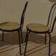 4 Black metal bistro chairs with plastic cane seat