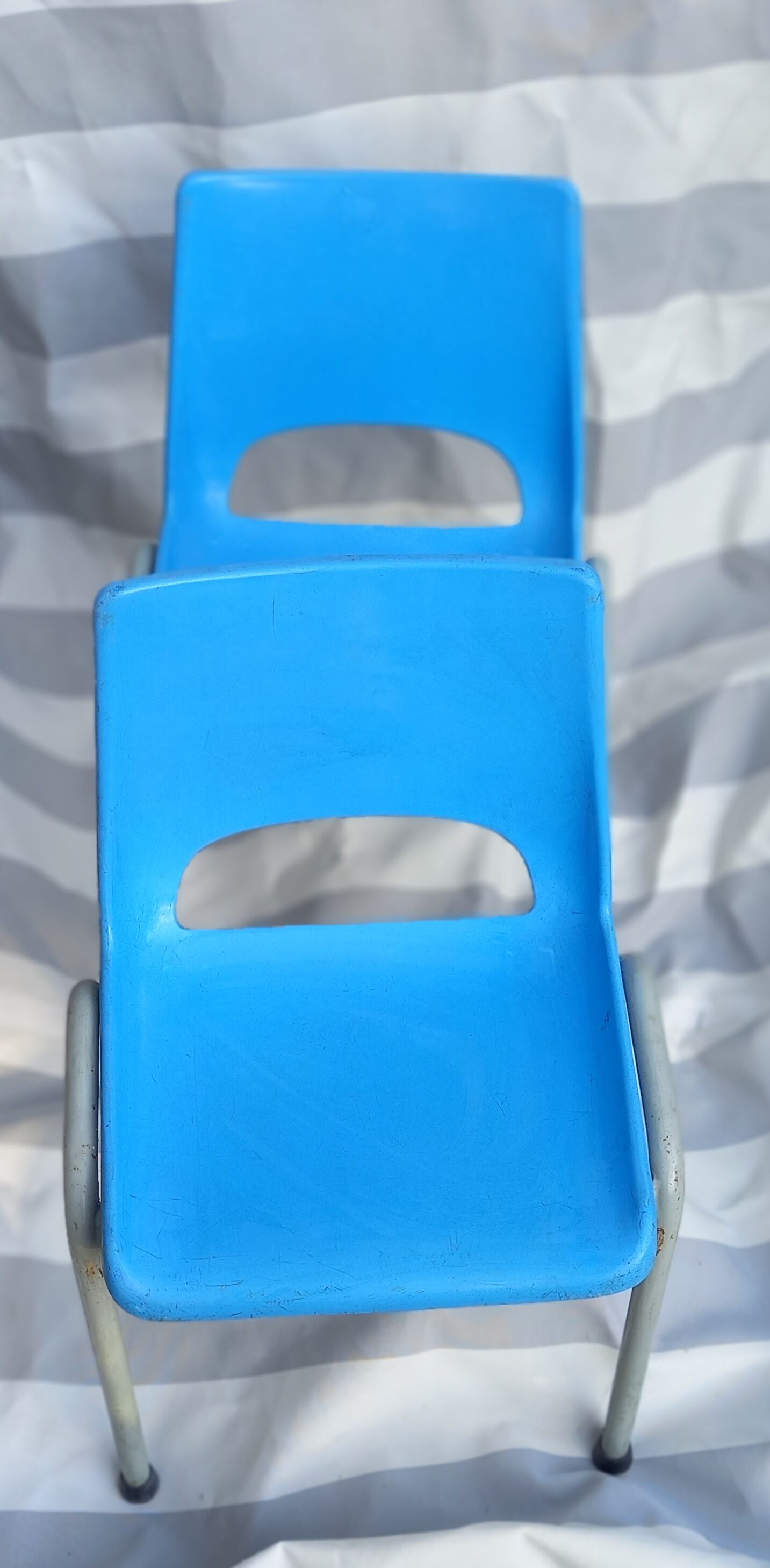 Pair of tubular metal child chains and plastic seat