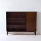 Vintage bookshelf with a door