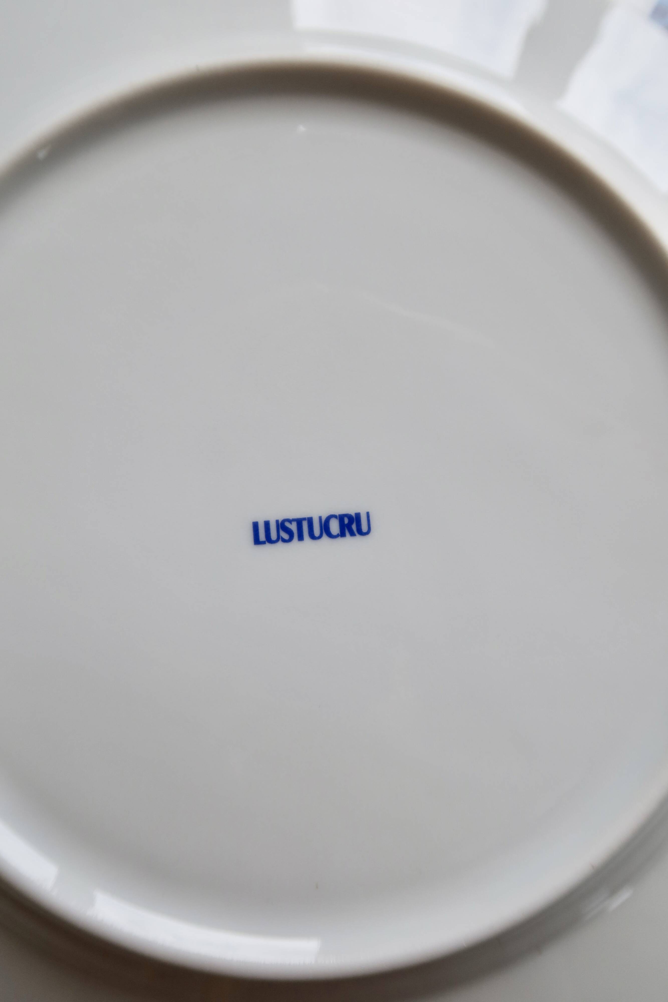 4 vintage Lustucru plates in porcelain with a blue checkered pattern.