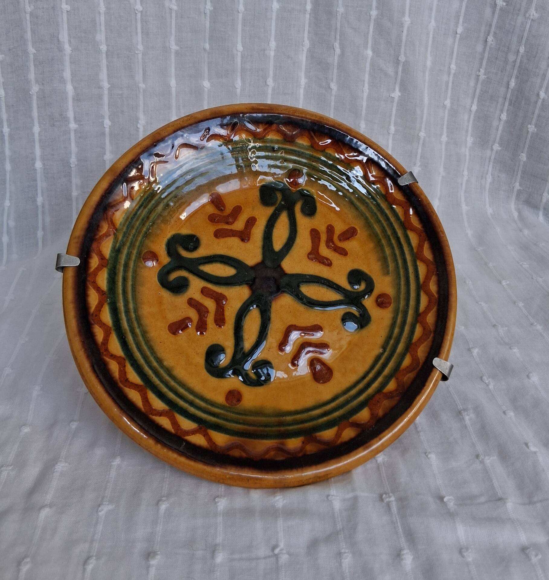 Decorative glazed earthenware plate stamped Biot, 18 cm. Vintage.