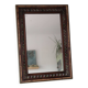Antique mirror with a carved and painted wooden frame