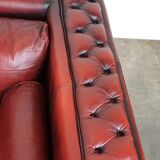 Beautiful red cowhide sleekly designed Chesterfield 2-seater sofa