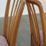 Set of 2 vintage dining chairs from the 1970s with spindle backrest and fabric seat