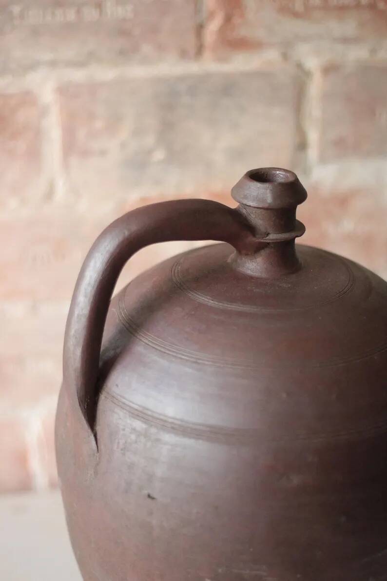 Old handled pot, antique pot, handled jar, interior decoration, collection, pottery.