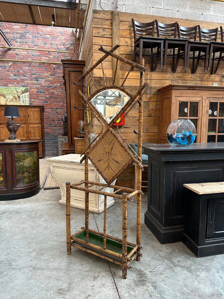 Entrance hall wardrobe in bamboo and rattan from the early 20th century.