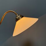 Adjustable brass table lamp with opaline glass shade