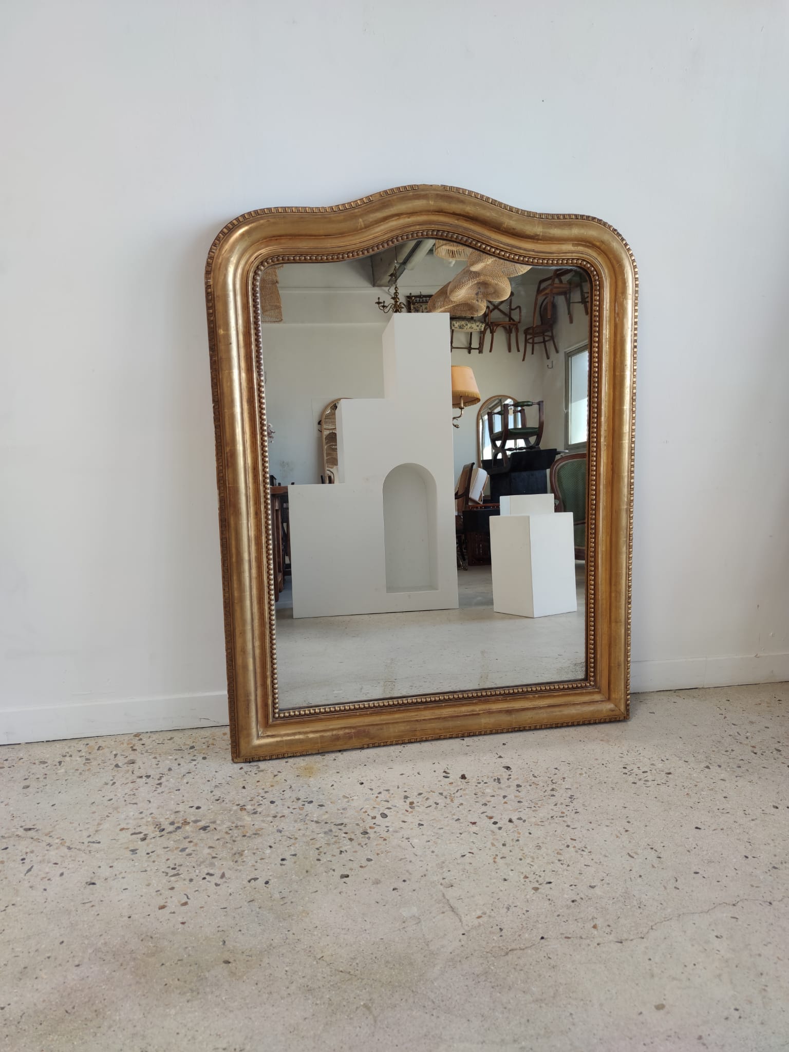 Louis Philippe gilded mirror with gendarme hat nineteenth H:130cm