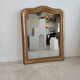 Louis Philippe gilded mirror with gendarme hat nineteenth H:130cm