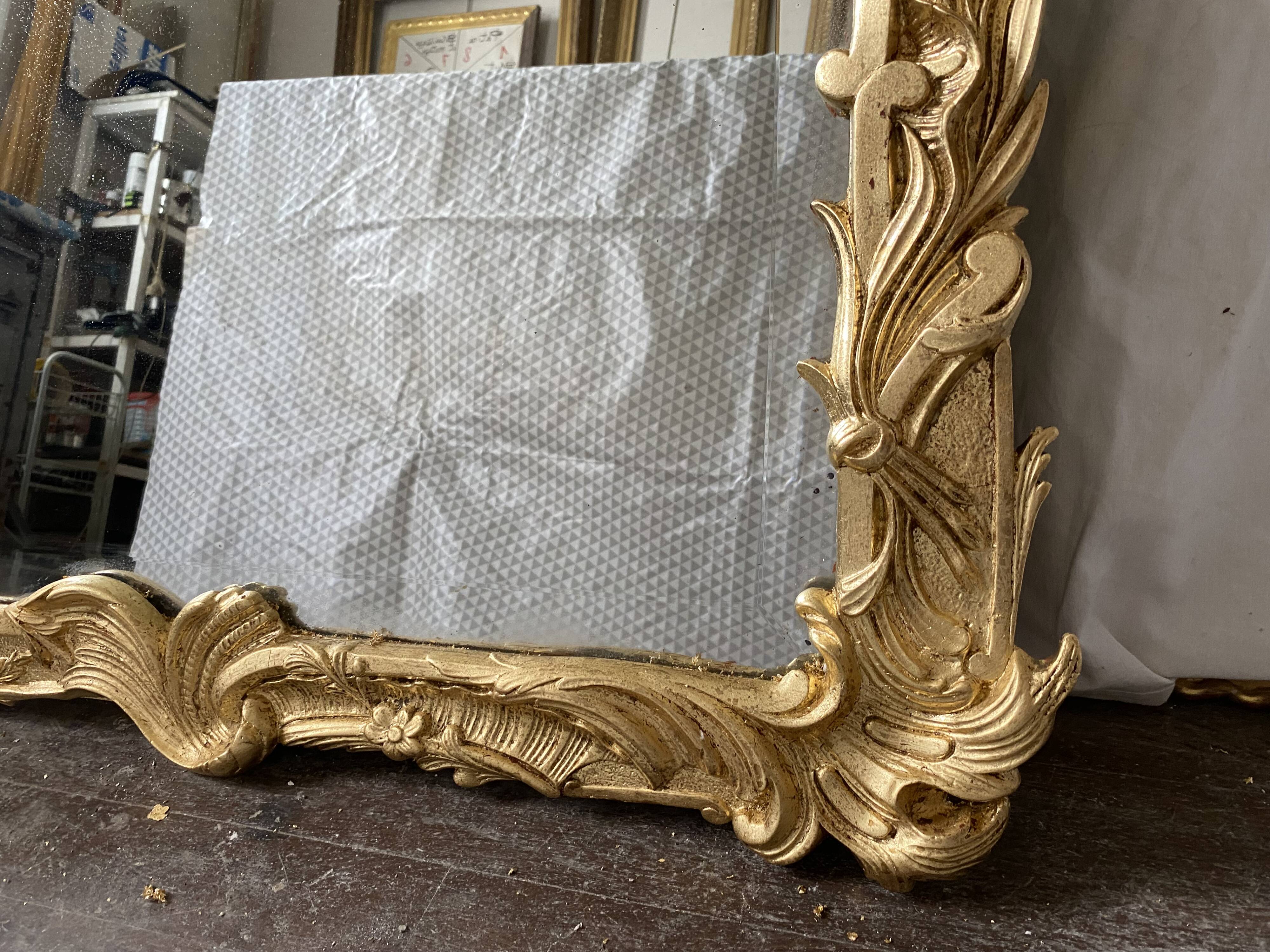 19th century gilded mirror with pediment