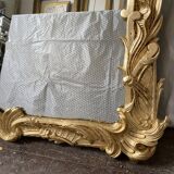 19th century gilded mirror with pediment