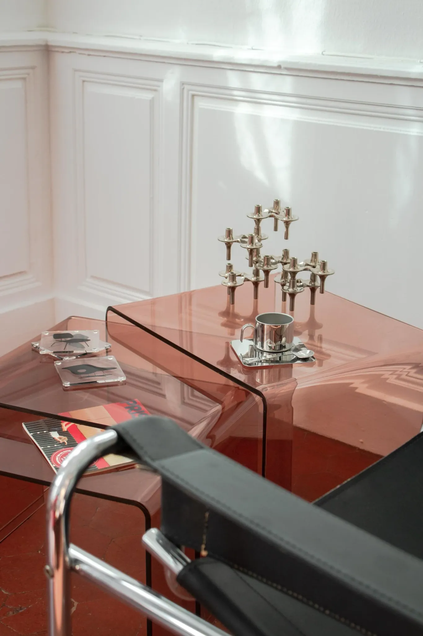 Vintage trio of nesting tables in smoked plexiglass by Michel Dumas, year