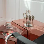Vintage trio of nesting tables in smoked plexiglass by Michel Dumas, year