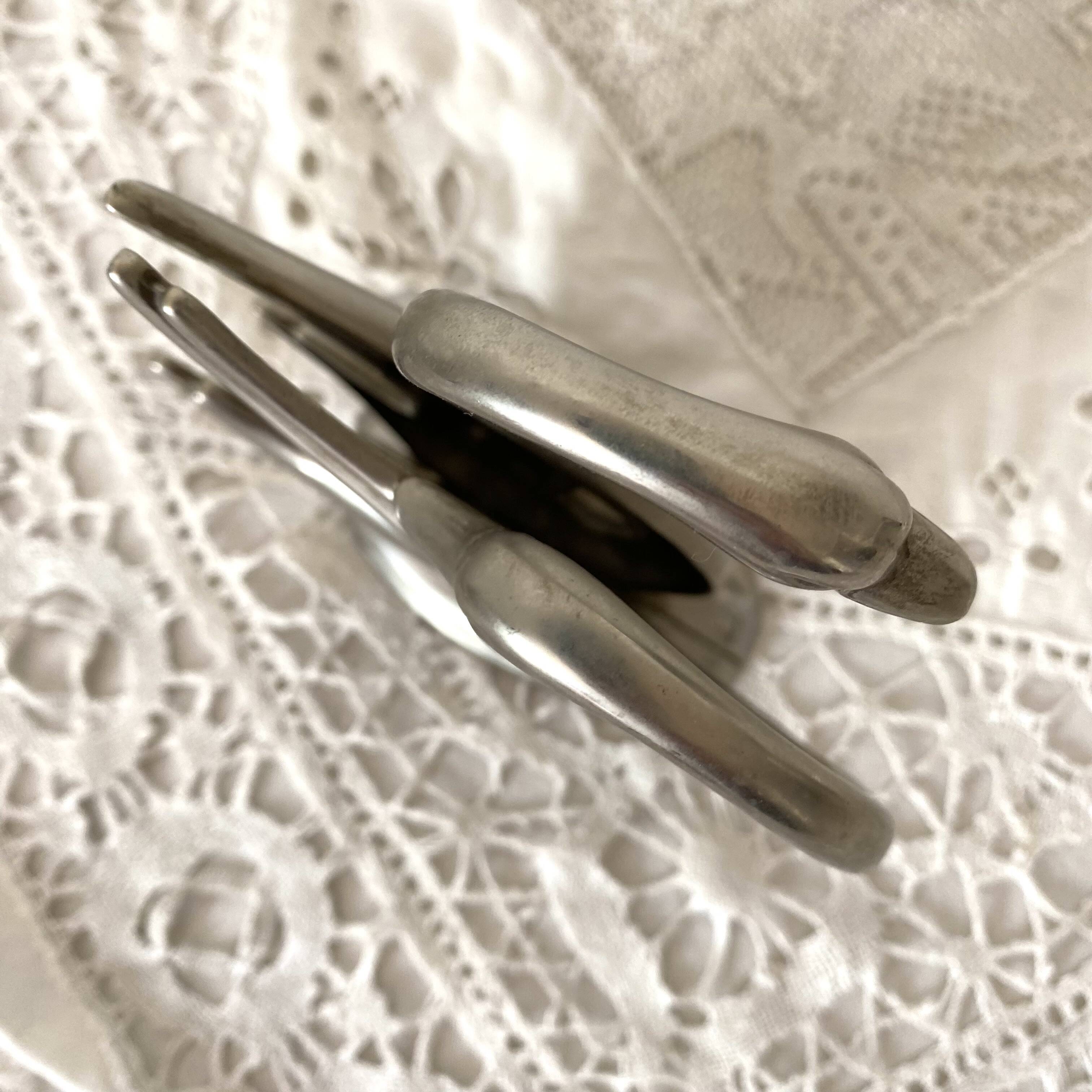 Zoomorphic letter holder, swans