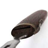 Fish knife and fork with a wooden and brass sheath sculpture.