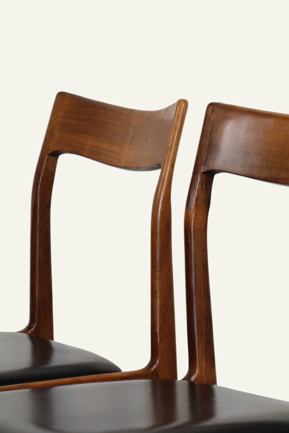 Set of 4 vintage teak and black faux leather chairs – 1960s