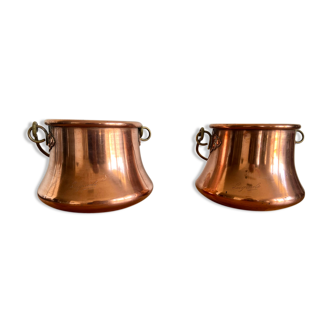 Lot of two pink copper pot covers