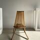 Foldable designer armchair in wooden slats
