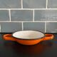 Orange enameled sheet egg dish