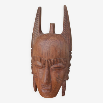 African wooden mask made of iroko wood