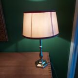 Silver metal lamp with its lampshade