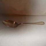 Silver metal serving spoon