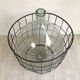 Demijohn and its metal basket