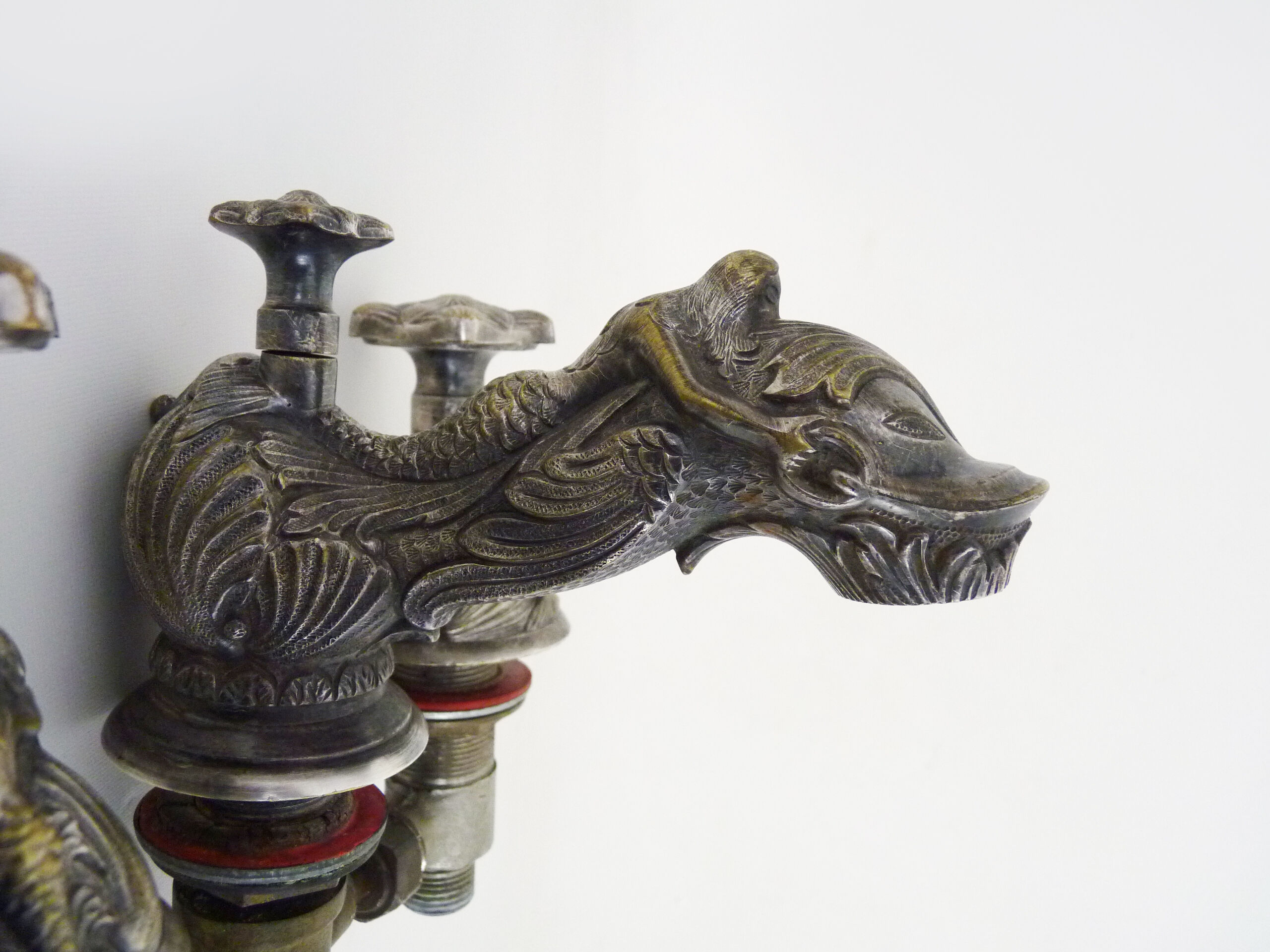 Old bathtub faucet, silver bronze kitchen with dolphin head and mermaid