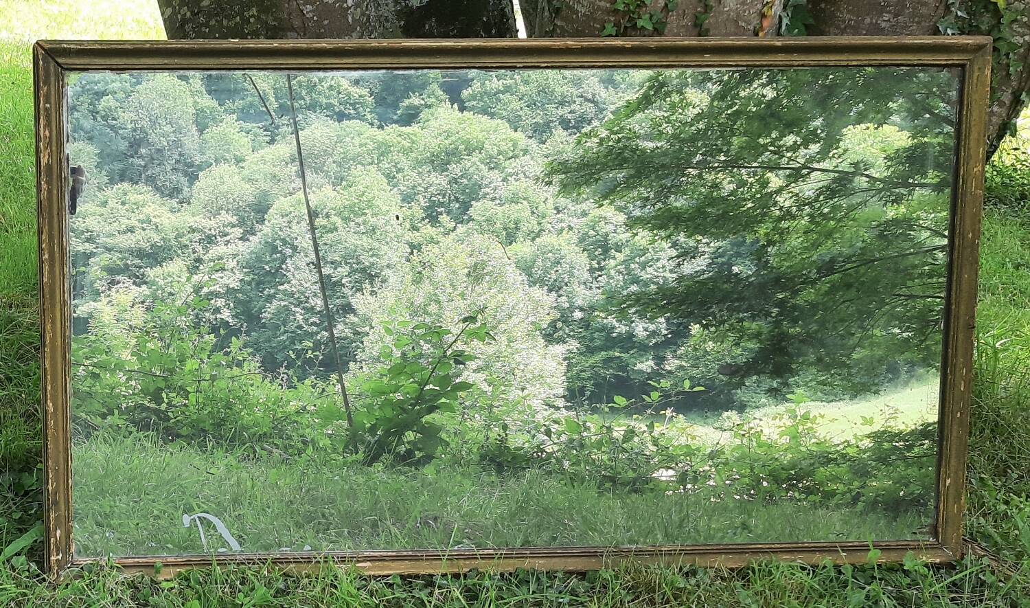 Antique mercury mirror. (Fireplace mirror)