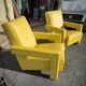 Pair of armchairs in sunny yellow leather