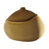 Ceramic with flattened body