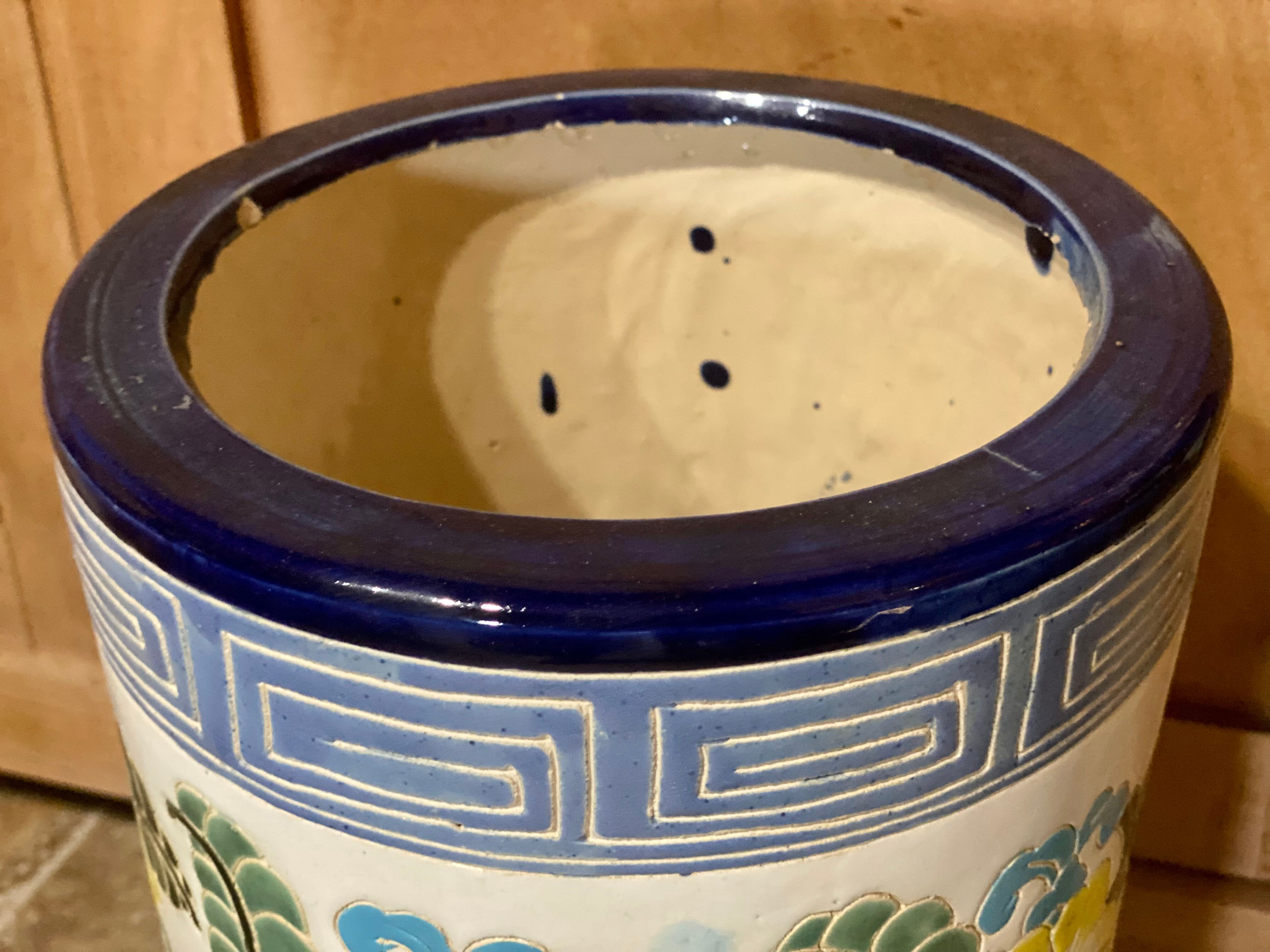 Enamelled ceramic umbrella stand