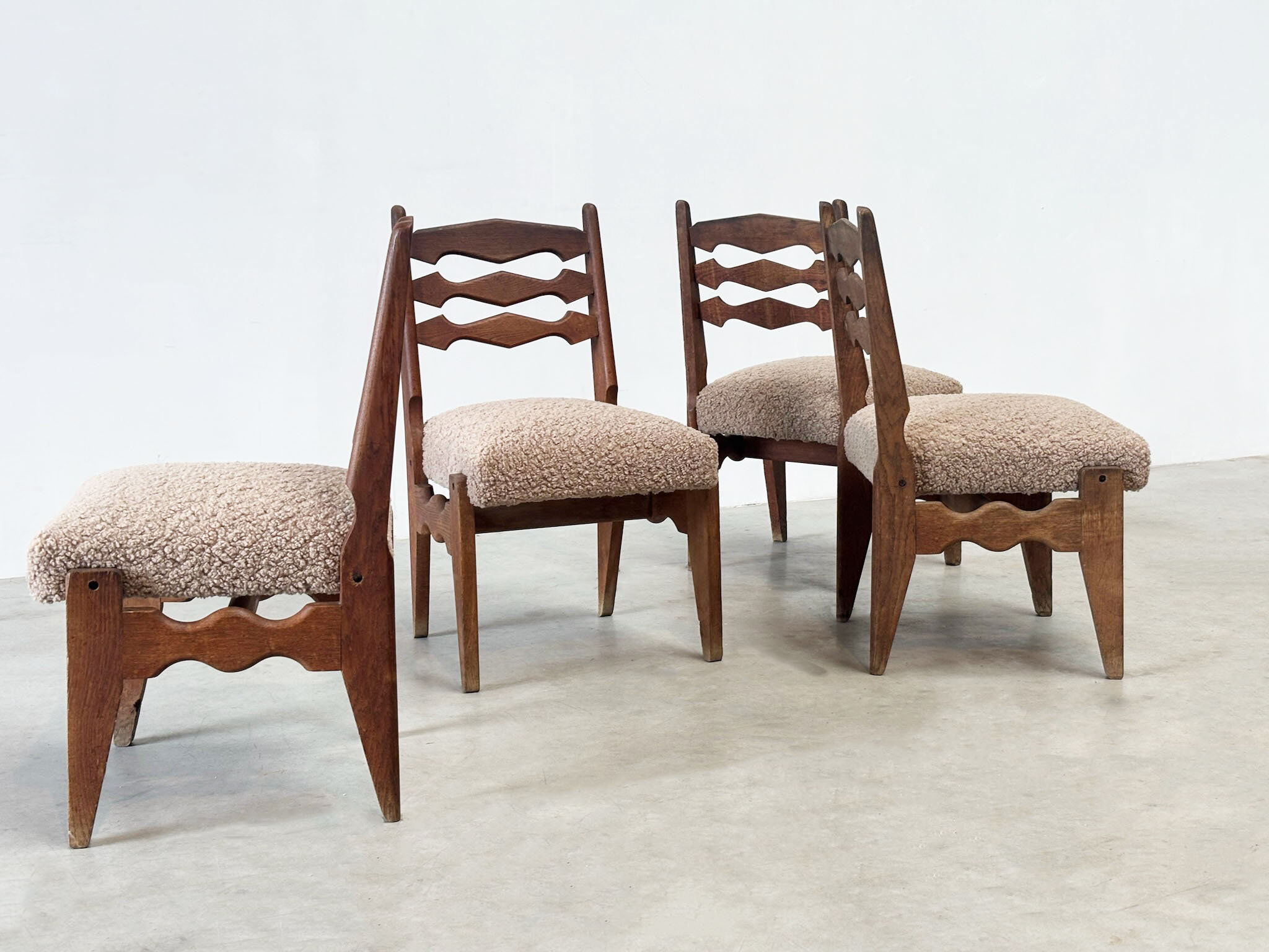 Set of four dining chairs by Guillerme & Chambron