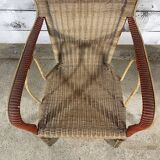 Rattan armchair and scoubidou decor
