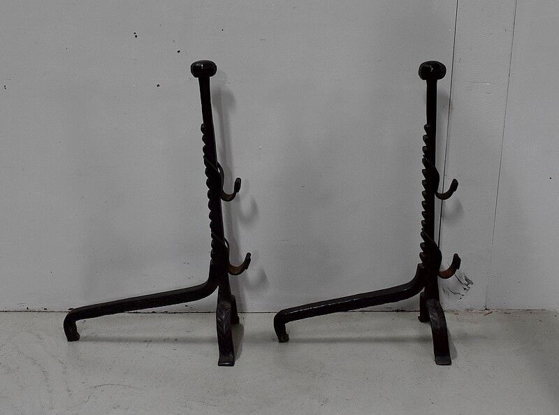 Pair of wrought iron chenets - late nineteenth century