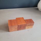 Vintage teak candlestick trio