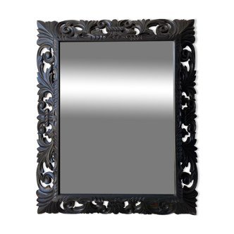 Carved wooden mirror