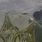 Old small cut on foot in yellow molded glass